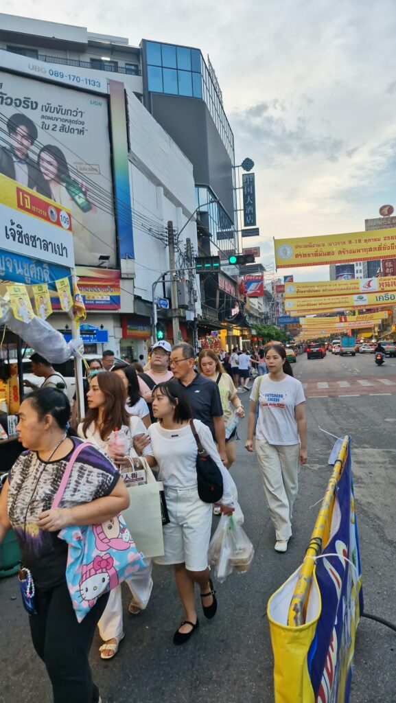 Crowds and Chinese shop signs on Yaowarat Road