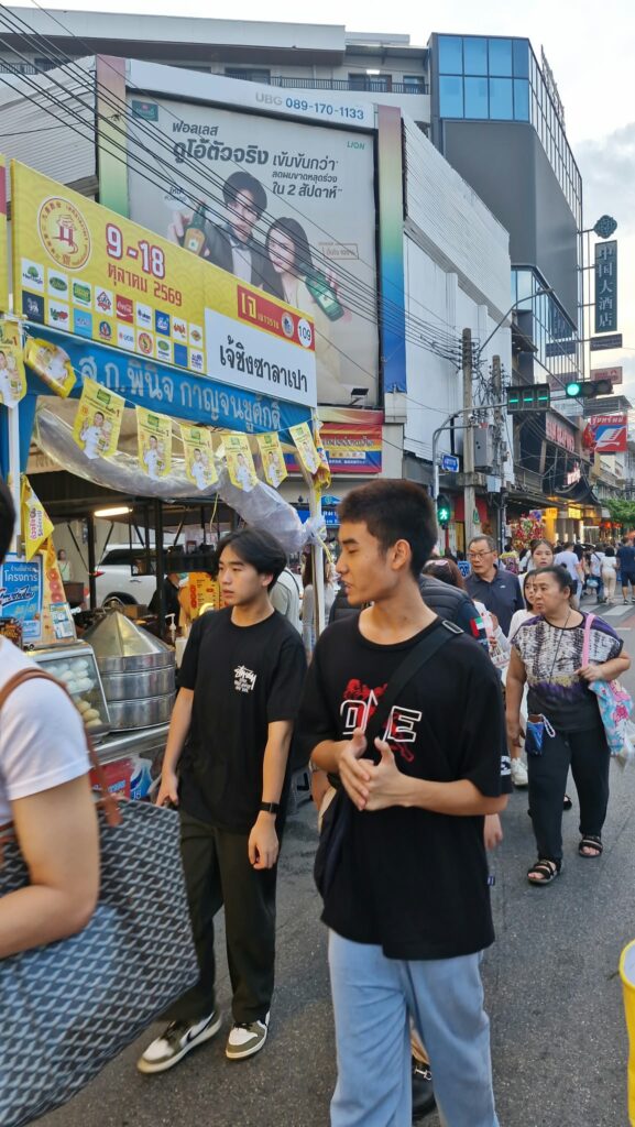 Young visitors in the vegetarian festival crowd