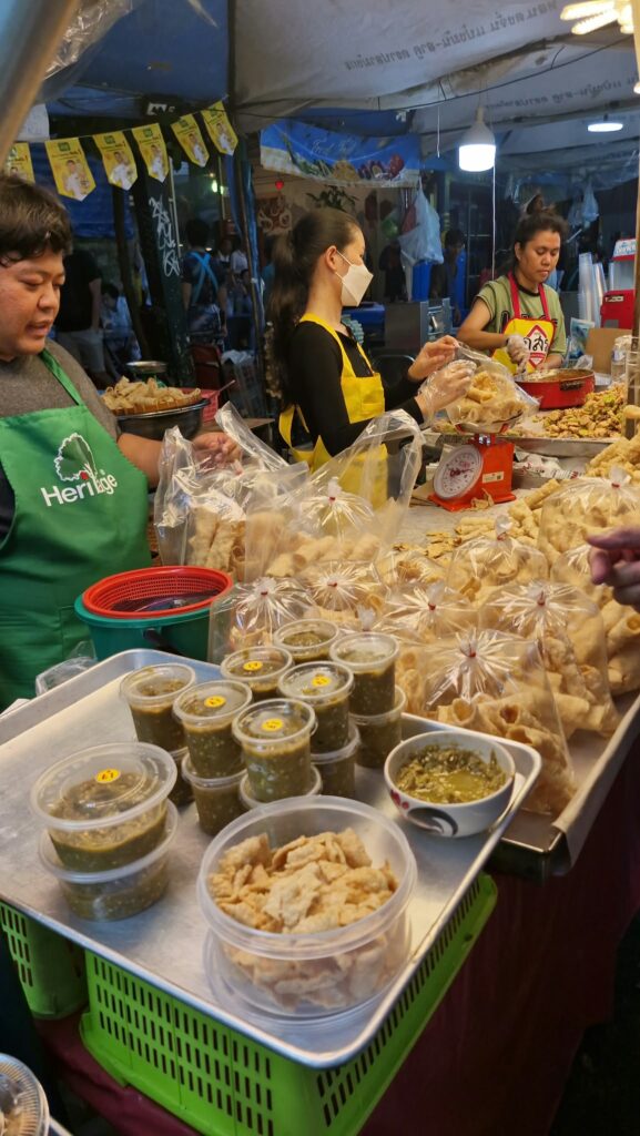 Cups of desserts and drinks on a jay stall